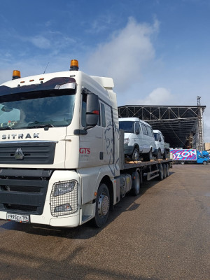 Тягач Sitrak C 7 H 6x4%BR%Трал Schmitz  SCS 24/L